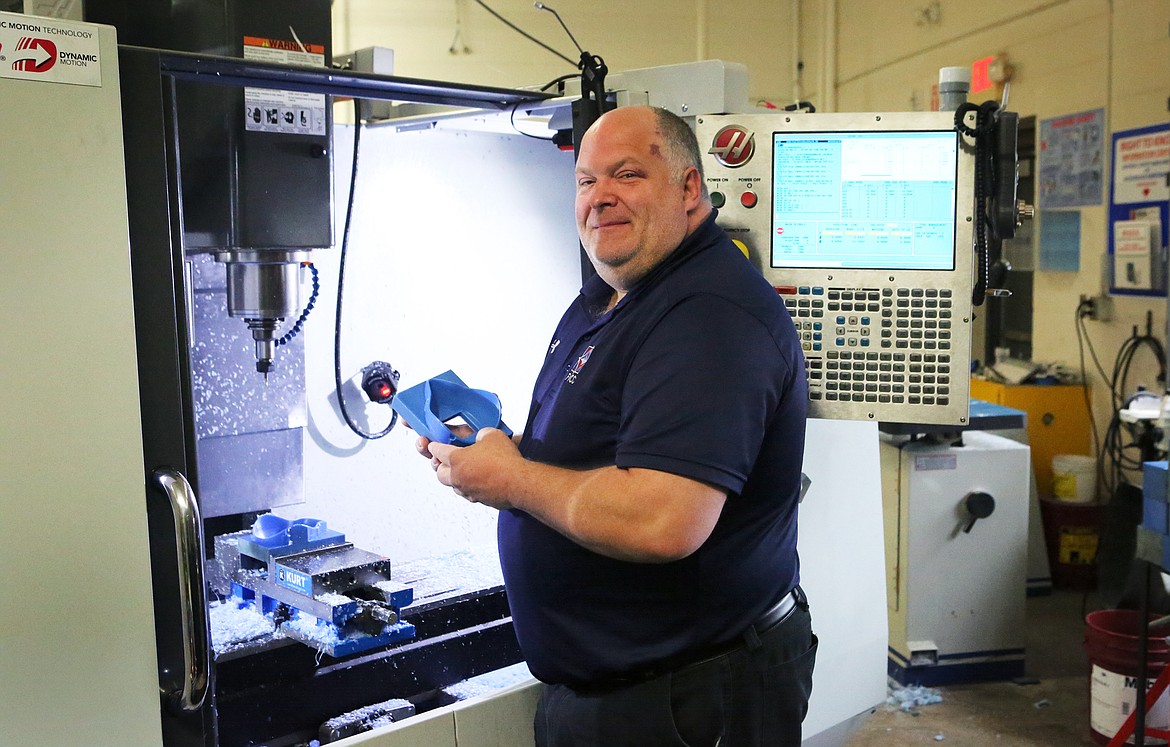 Educators, professionals use 3D printers to make N95 masks Daily